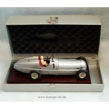 Mercedes-Benz Silberpfeil Rennwagen aus Feinblech, mit Uhrwerkantrieb, auf Holzsockel, Nr.1, mit Fahrerfigur, in Kunststoffkoffer,