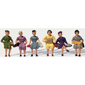 Reisende sitzend (weiblich)