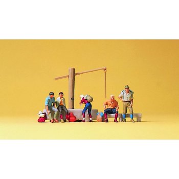 Rastende am Dorfbrunnen