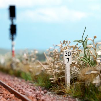 Kilometersteine, 40 beidseitig bedruckte Steine zur Markierung einer Strecke von 3,9 km, Größe 4 x 1,5 x 20 mm