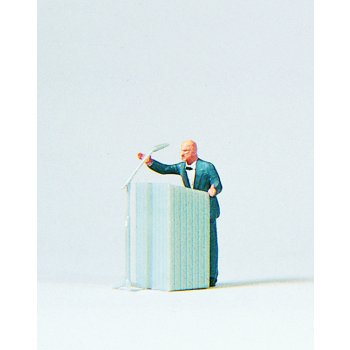 Kleiner Mann - große Worte, am Rednerpult