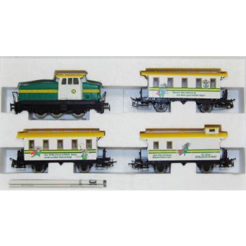 Jubiläums-Zug 20 Jahre Spielzeug-Ring: 1 Diesellok, 2 Personenwagen verschieden bedruckt bunte Mäuseabbildungen, 1 Gepäckwagen bunte Mausabbildung