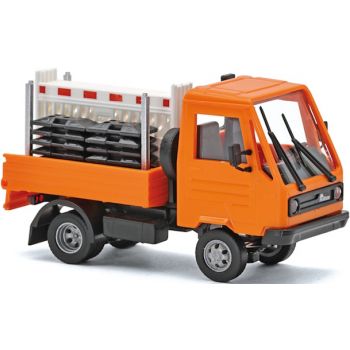 Multicar M26 Pritsche, beladen mit Schrankenzäunen und Transportgestell, orange, Baujahr 1991