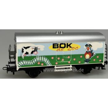 BOK de Loc ( mit Phantasieabbildung einer Dampflok, einer Kuh, Blumenwiese und Schienenstrang), mit Märklin-Signet
