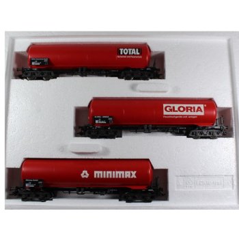 Feuerlöschzug, Inhalt 3 4achsige rote Kesselwagen: 1) TOTAL Sicherheit und Feuerschutz 2) GLORIA Feuerlöschgeräte und -anlagen 3) MINIMAX