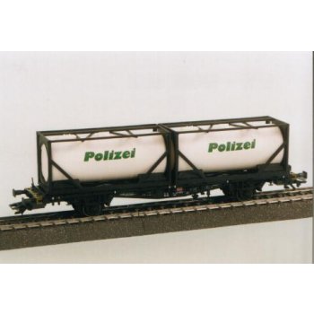 Containerwagen beladen mit 2 abnehmbaren weißen Tankcontainern 'POLIZEI', mit schwarzem Rahmengestell