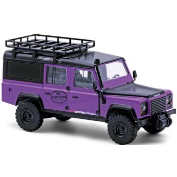Land Rover Defender mit Dachträger, Pistenkuh, lila/schwarz, Baujahr 1983