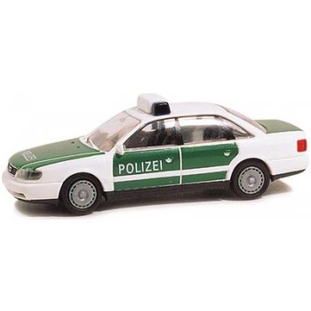 Audi A6 der POLIZEI, weiß/grün, mit weißerm Schriftzug 