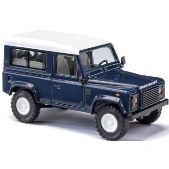 Land Rover Defender 90, blau mit weißem Dach, Baujahr 1983