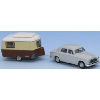 Peugeot 403.7 Limousine Baujahr 1960, perlgrau, mit beige/elfenbeinfarbenem Eriba Wohnwagen