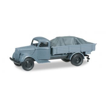 Ford V 3000 Pritschen-LKW mit Ladung unter Plane