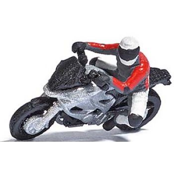 Kurvengratzer 1 - modernes Motorrad (silber) mit Fahrer in rasanter Kurvenfahrt, mit 3 Leitplanken und 8 Begrenzungspfosten