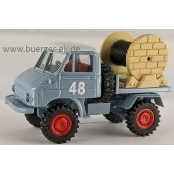 Unimog 411 Pritsche - 48, beladen mit Kabeltrommel (lose beiliegend), 